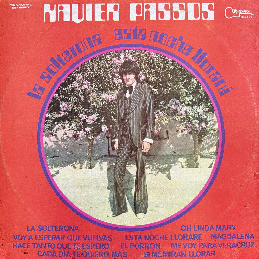 Vinyl record cover for 'La Soltera' by Navier Passos, featuring a central photo of a man in a pinstripe suit standing in front of flowering trees, set against a bright red background with blue and white text.